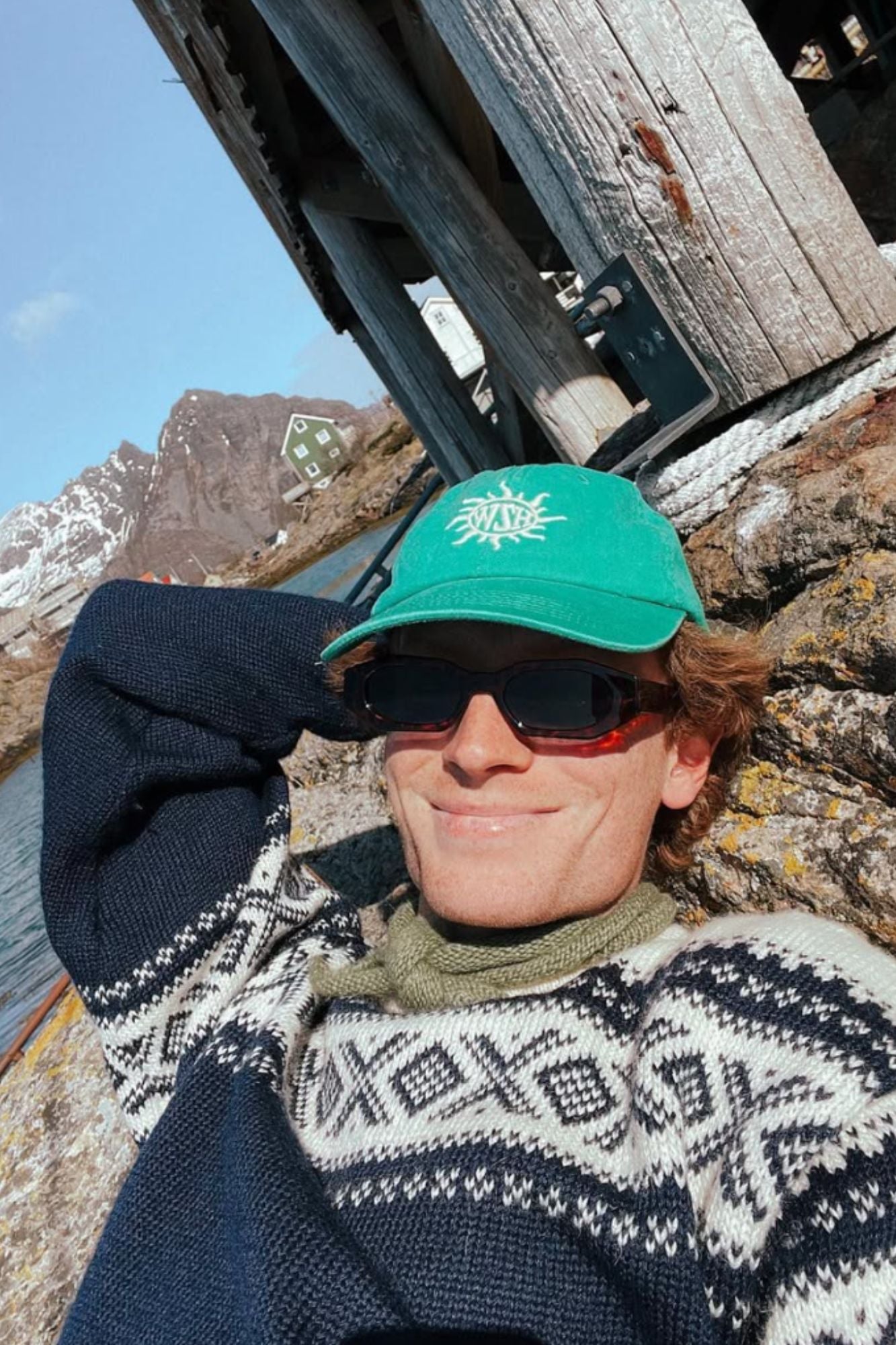 &Aring;dne Birkeland smiling with a blue cortina sweater from Dale of Norway and a caps