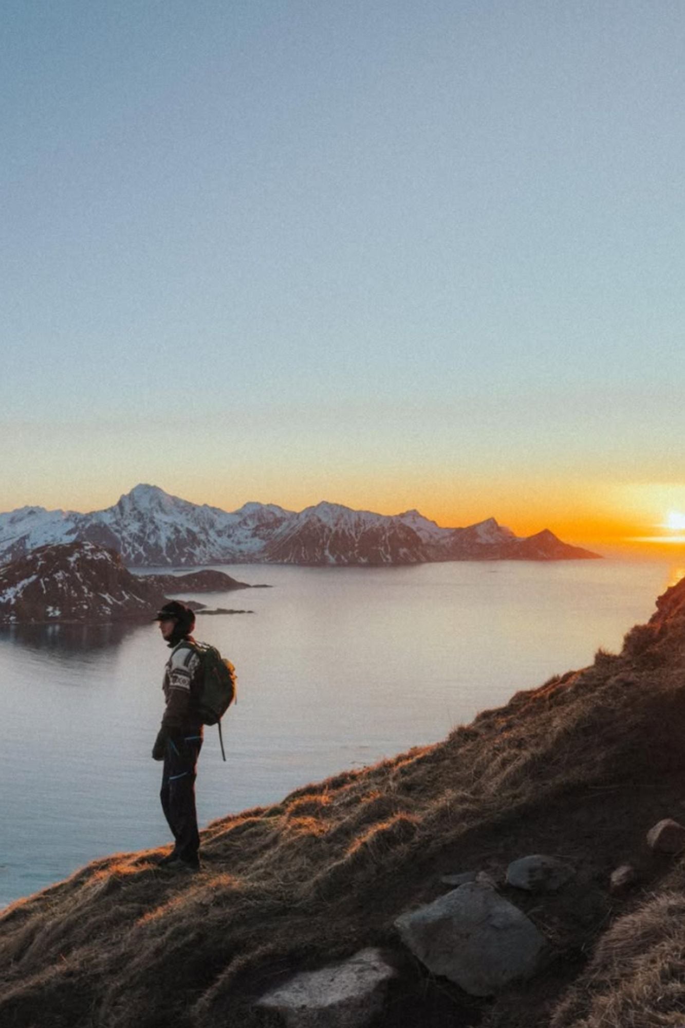 &Aring;dne Birkeland wearing the Cortina Sweater on a hike in Lofoten during winter