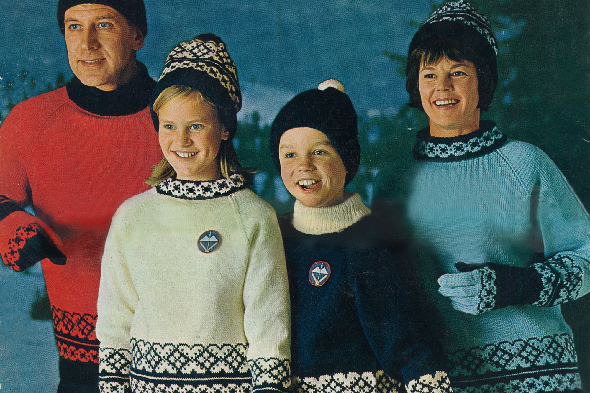Family wearing the championship sweater from 1966. World Ski Championships - Innsbruck, Austria.